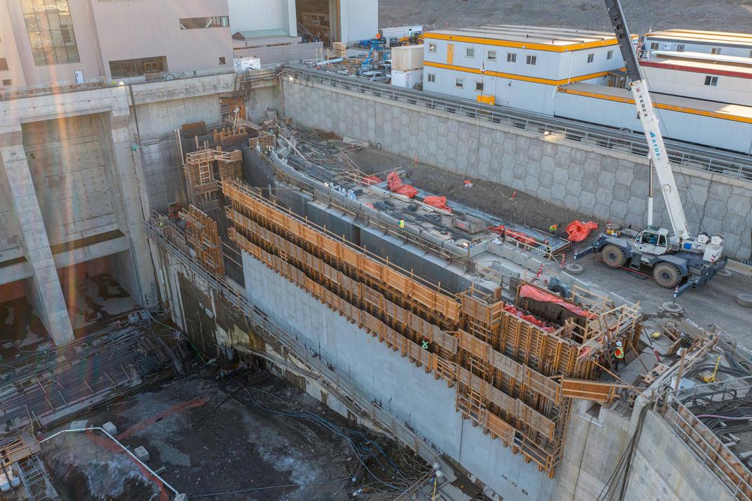 Front-view of concrete placement and formwork installation at the permanent upstream fish passage facility. | October 2022