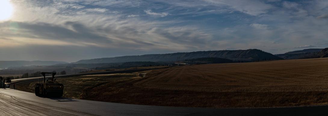 West-facing view of Highway 29 at Cache Creek east, as crews pack the top lift of asphalt. | October 2022