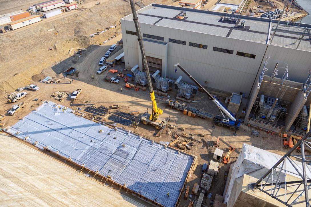 Formwork and reinforcing steel are placed on the concrete slab to construct the emergency response (ERT) team building. | July 2024