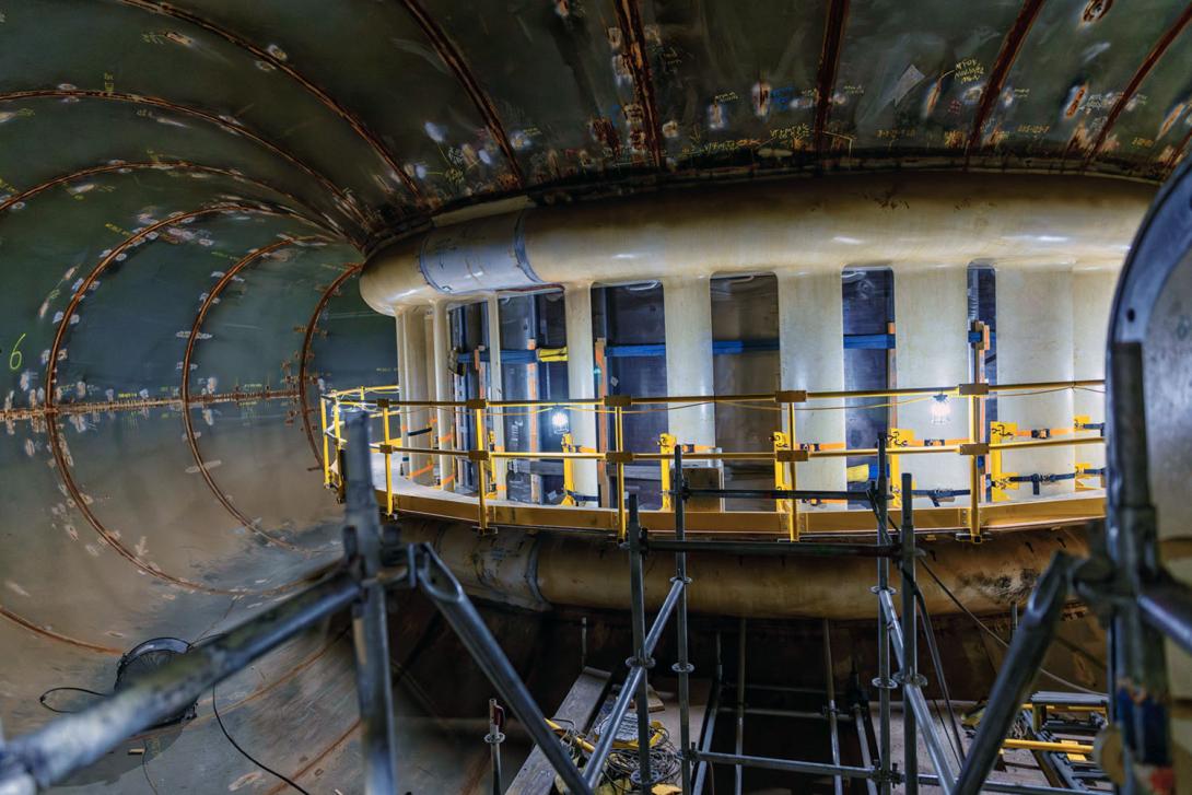 Inside the unit 6 spiral case. This is where water is delivered to the turbine. The stay-ring and wicket gates are visible. | June 2024