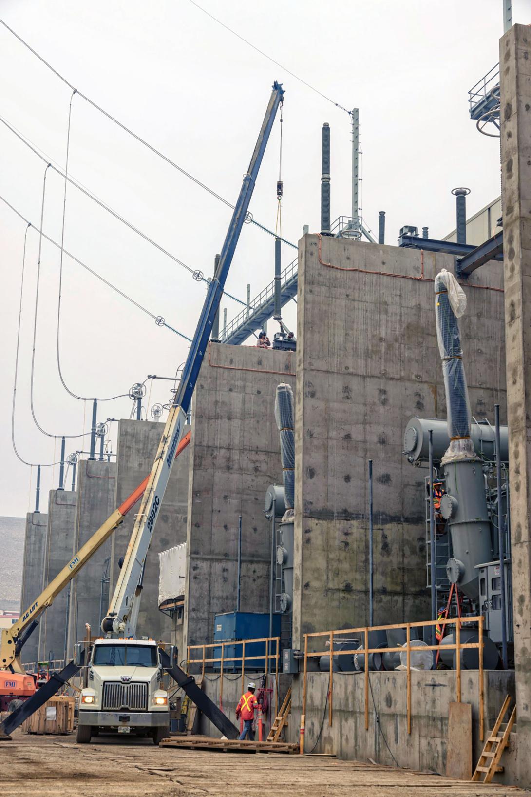 Installing high voltage bushings. | July 2024