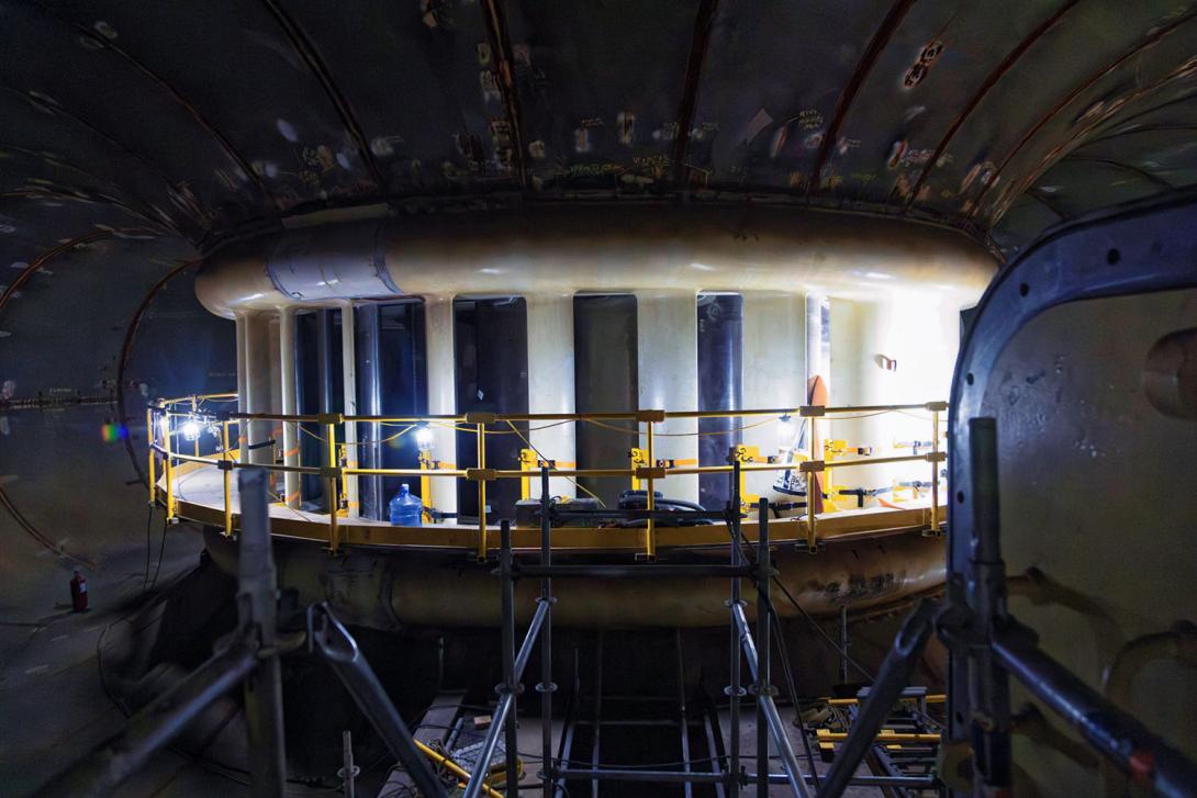 Inside unit 6 spiral case. The stay ring can be seen with the wicket gates behind. | July 2024