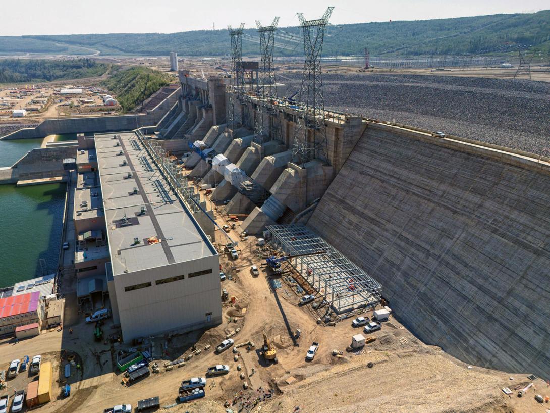 The transformers, penstocks and emergency responder building are located behind the powerhouse. | August 2024