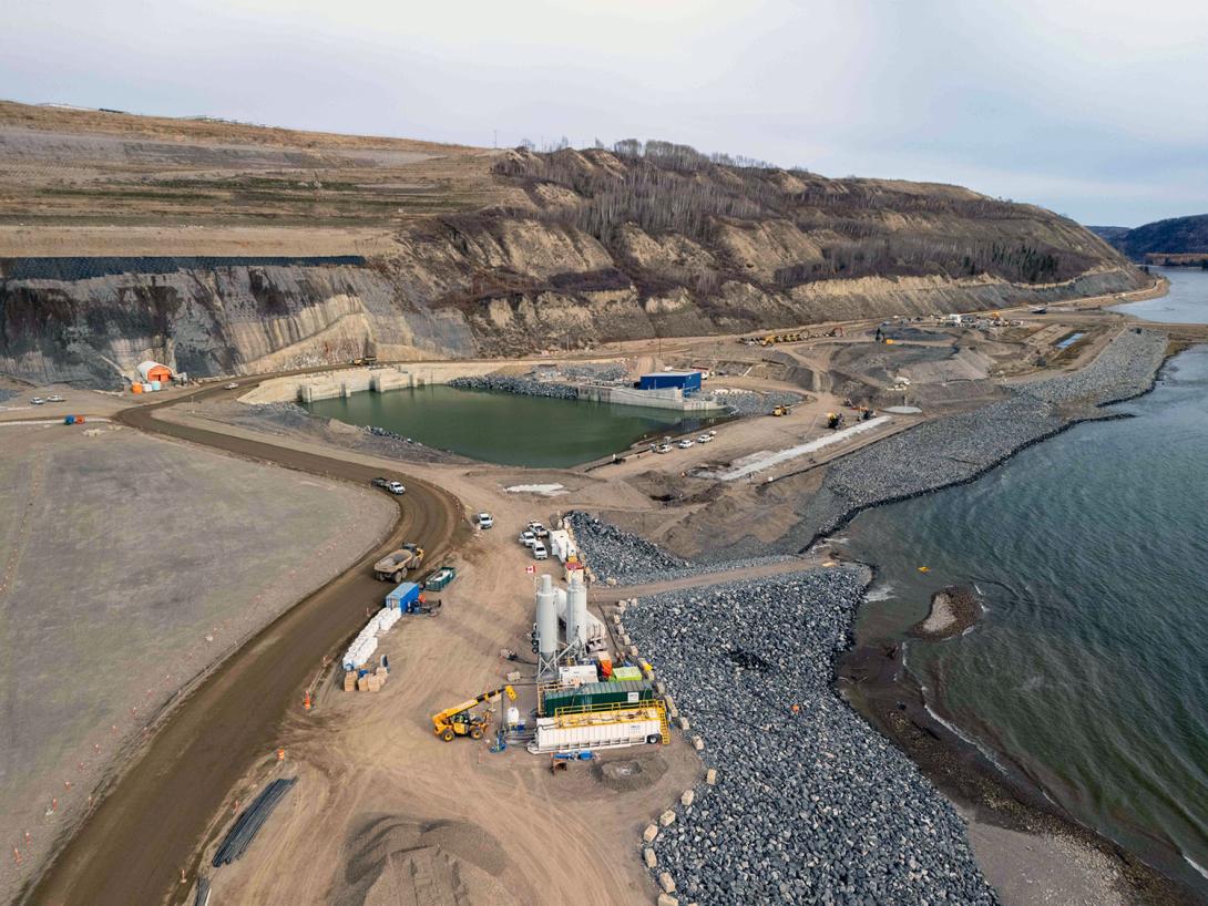 A coffer dam is in place in front of the diversion tunnel outlet portals so the tunnels can be backfilled. 