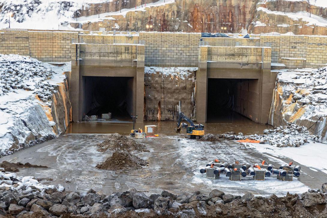 The diversion tunnels have a 10-metre interior diameter. The Peace River was diverted through these tunnels in September 2020. The tunnels were closed to fill the reservoir in August 2024. | December 2024