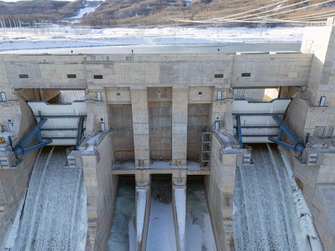 Spillway operating gates release water through the spillways from the reservoir. The spill will decrease and ultimately end as more generating units go into operation. | January 2025