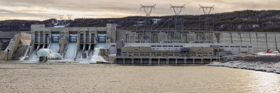 The Site C generating station and transmission system with the tailrace in the foreground. | February 2025