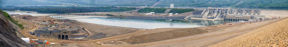 Backfilling is underway at the diversion tunnel outlet portal on the north bank, across from the south bank spillways and generating station. | June 2025