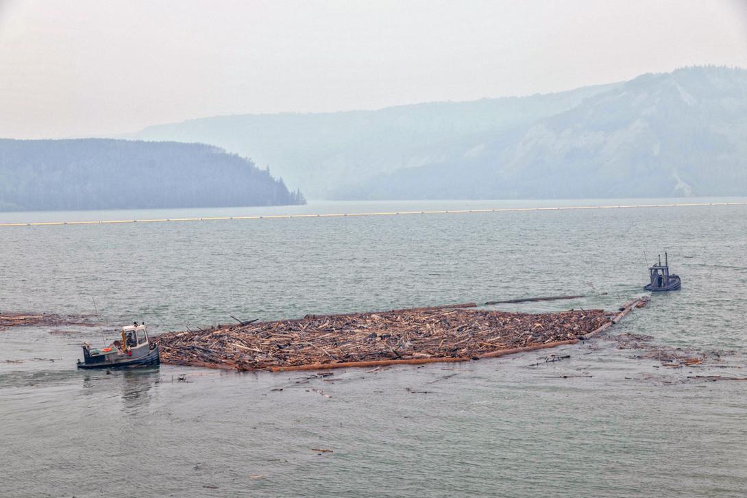 Reservoir debris is collected and relocated where it can be removed from the water and stockpiled. | June 2025
