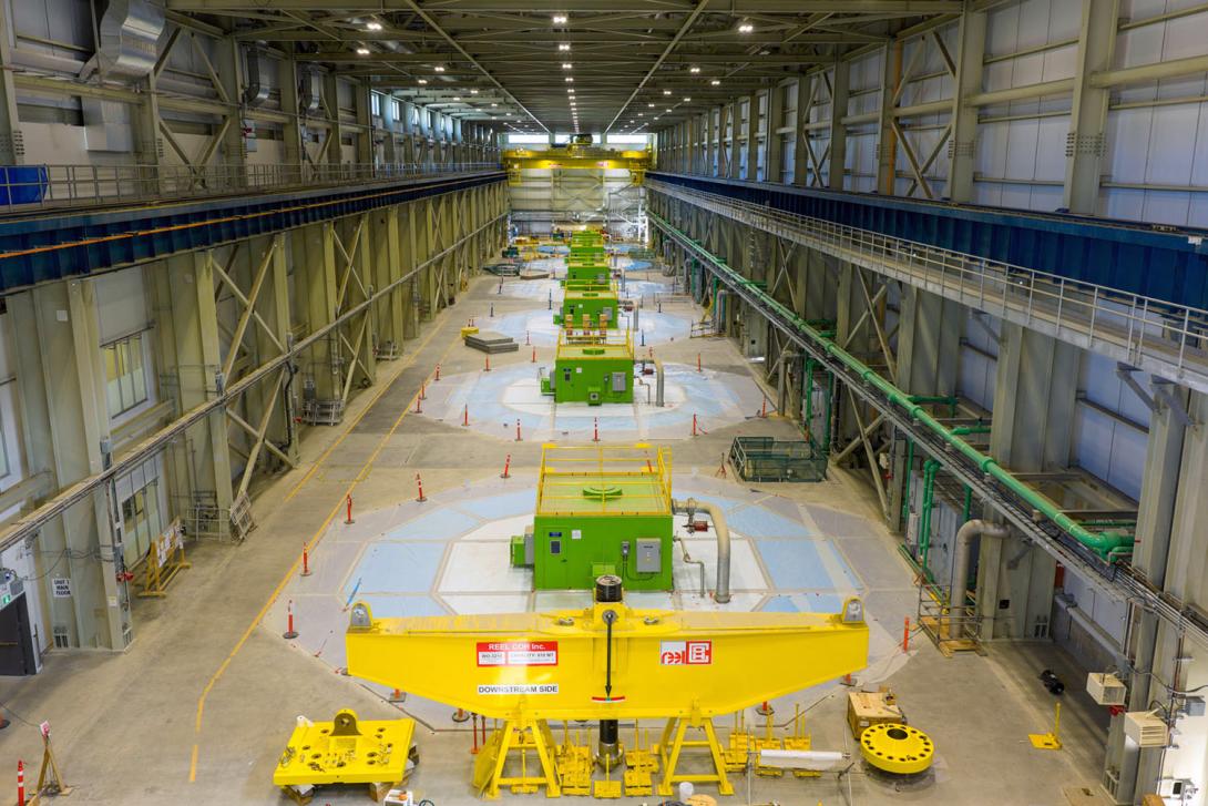 Generating units 1 (foreground) through 6 in the powerhouse and lifting beam at bottom. | July 2025