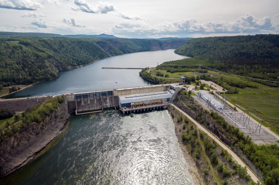 The Site C reservoir ends at the tailrace of the Peace Canyon Dam. The Dinosaur Reservoir is shown at the top of the photo. | July 2025