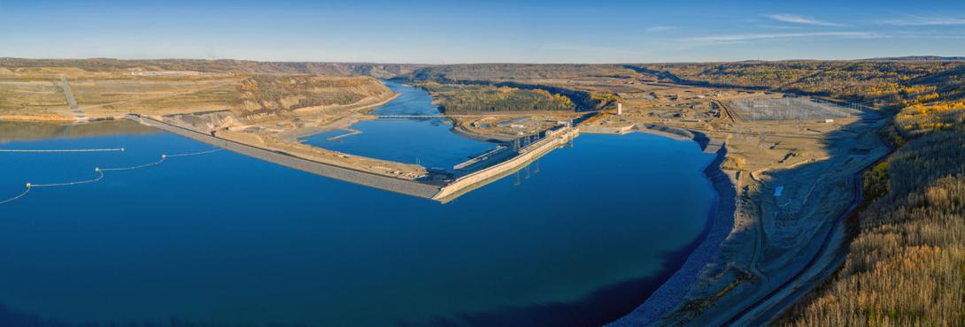A downstream view of the Site C dam and generating station. The Peace River is at top centre. | October 2025