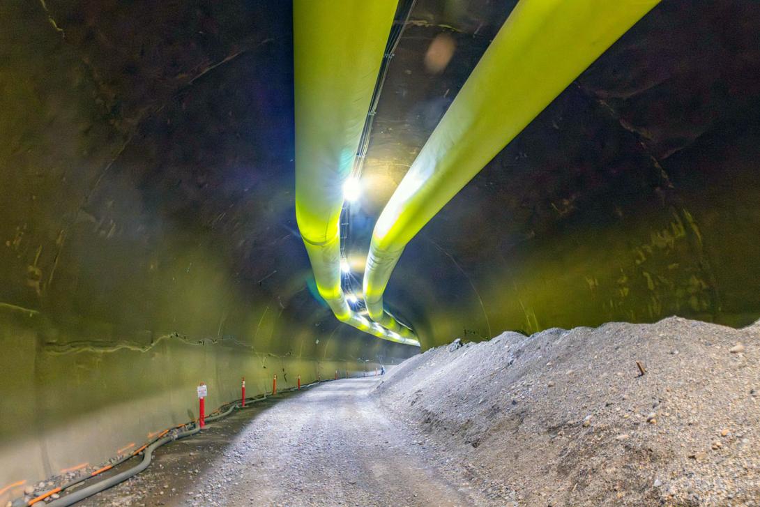 Heat and fresh air ducting line the diversion tunnels. Backfill material is stored in the tunnel. | November 2025